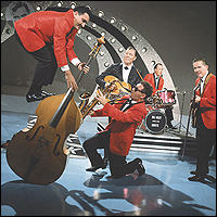 Bill Haley and the Comets rock out in an early TV performance.
