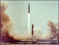 Apollo 11 blasts off from Cape Kennedy.