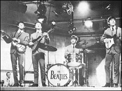 The Beatles perform on British TV in 1963.