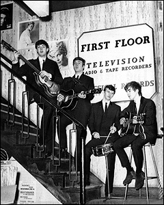 The Beatles in Brian Epstein's NEMS record store.