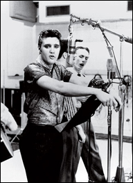 Elvis Presley recording at Sun Studios, circa 1954.