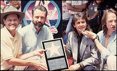 The Monkees receive a star on the Hollywood Walk of Fame on July 10, 1989.