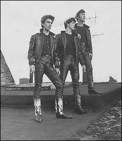 The Beatles is their "teddy boy" gear, complete with cowboy boots!